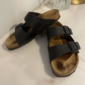 Black Birkenstocks with black buckles